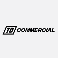 TD Commercial logo featuring bold, black lettering with "TD" in a slanted box and "COMMERCIAL" in italicized font, representing Tire Discounters’ fleet and commercial services division.