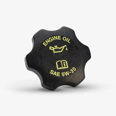 Close-up of black engine oil cap labeled SAE 5W-30 for oil change service.