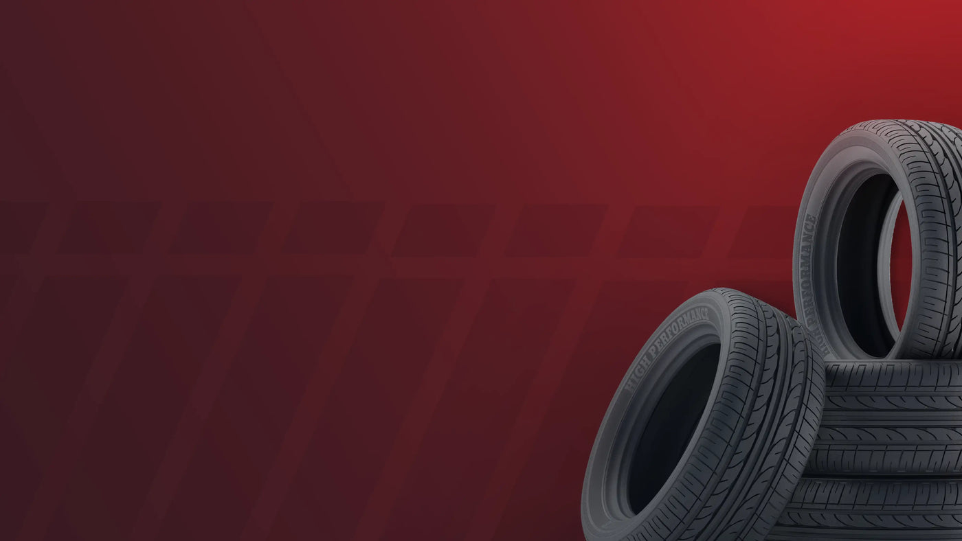 Stack of high-performance tires on red background, showcasing tread design for cars and SUVs.