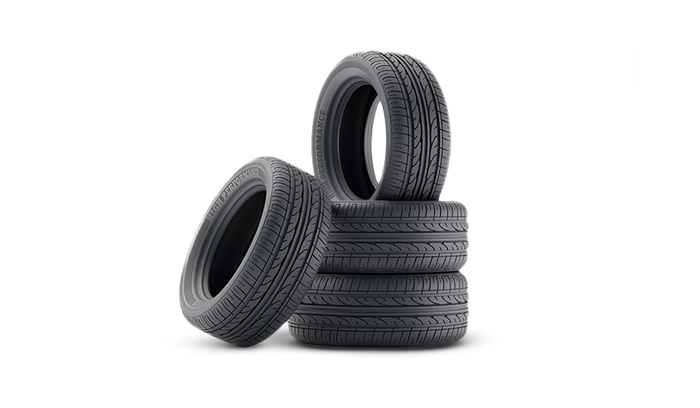 Stack of new car tires representing tire sales, installation, and service at Tire Discounters