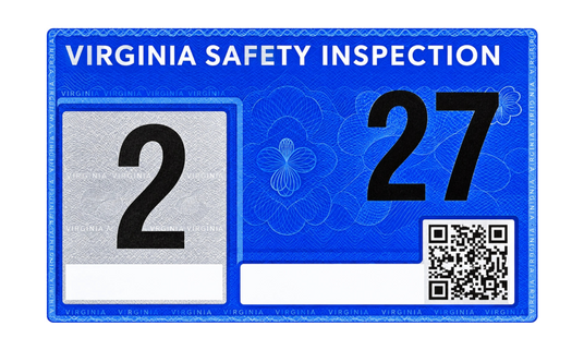 A blue Virginia safety inspection sticker with the text 'VIRGINIA SAFETY INSPECTION' at the top, a large black number 2 on a white square, a large black number 27, and a QR code in the lower right corner.