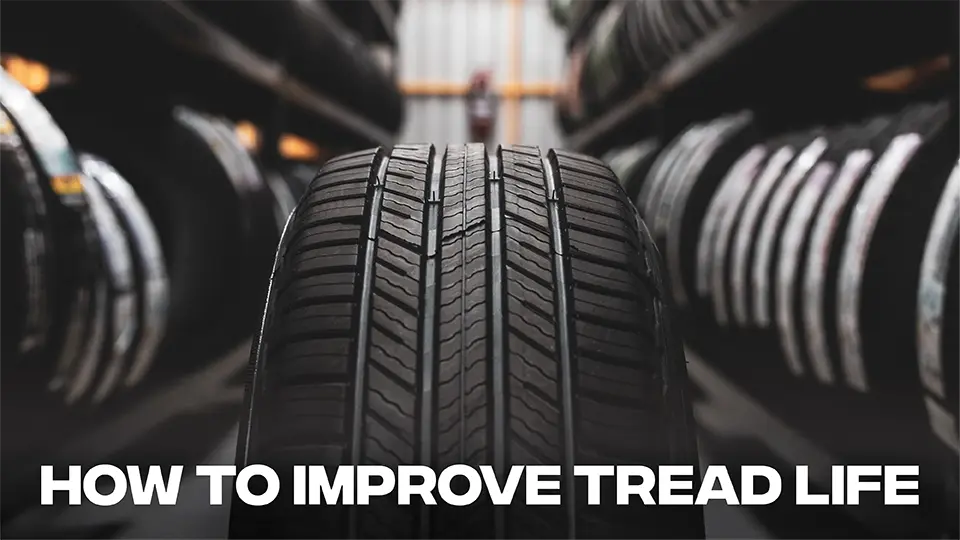 Close-up of tire tread with the title: How To Improve Tread Life