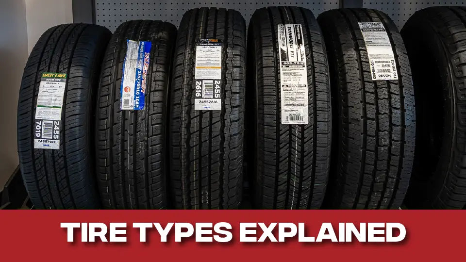 A rack of different types of tires at a Tire Discounters location