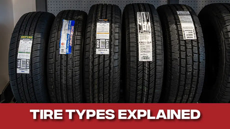 A rack of different types of tires at a Tire Discounters location