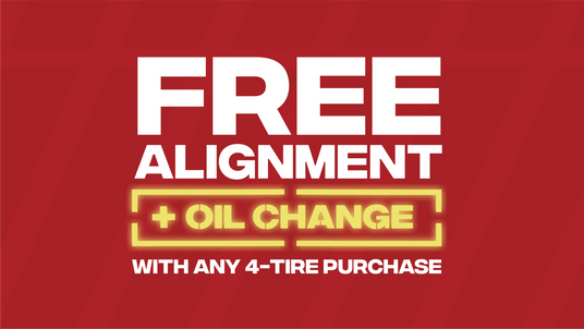 Promotional text for free alignment and oil change with 4-tire purchase on a red background