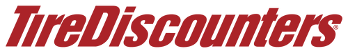 Tire Discounters logo in bold red text, representing the tire and auto service retailer known for free alignment and deals.