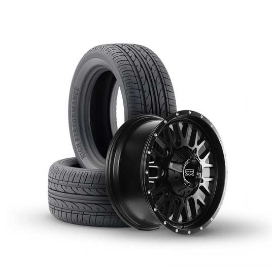 Close-up of new tires and black custom rim showcasing premium wheels and tire services at Tire Discounters