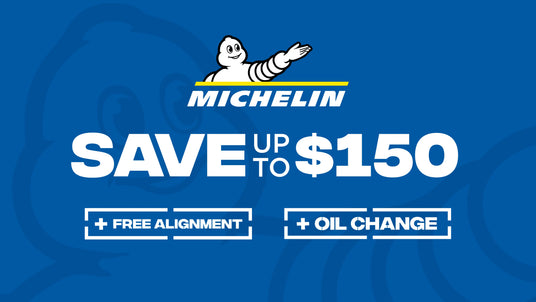 Michelin advertisement on a blue background with text about savings and free services.