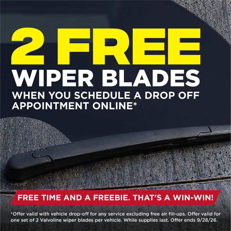 Promotional graphic for free wiper blades, featuring large yellow and white text over a dark car windshield and a black wiper blade. A red banner at the bottom reads 'FREE TIME AND A FREEEBIE.